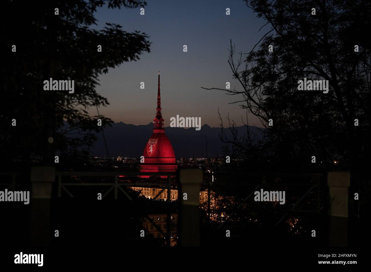 Fabio Ferrari/LaPresse May 04, 2020 Turin, Italy Sport EXCLUSIVE TORINO FC Torino FC - The Mole Antonelliana is illuminated with a grenade in honor of Grande Torino Stock Photo