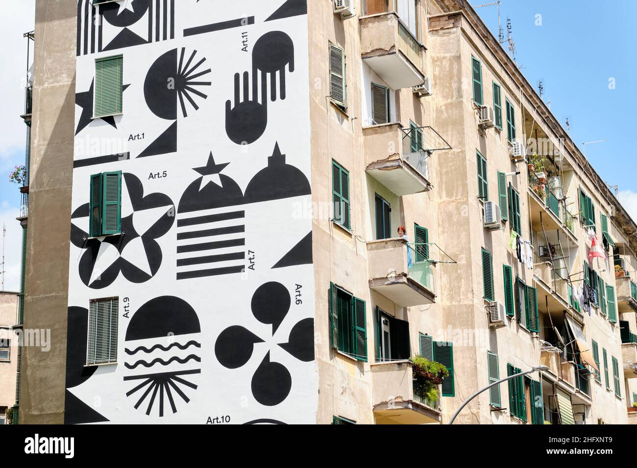 Mauro Scrobogna /LaPresse May 07, 2021 Rome, Italy News Street art - the most beautiful constitution in the world In the photo: The work of the artist Greg Jager to celebrate the Italian Constitution inaugurated on a building in the Garbatella district Stock Photo