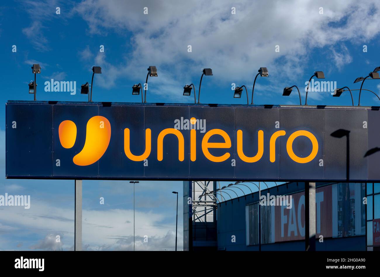 Genola, Cuneo, Italy - January 14, 2022: Sign with logo Unieuro, it is an Italian chain of stores specializing in IT, telephony, consumer electronics Stock Photo