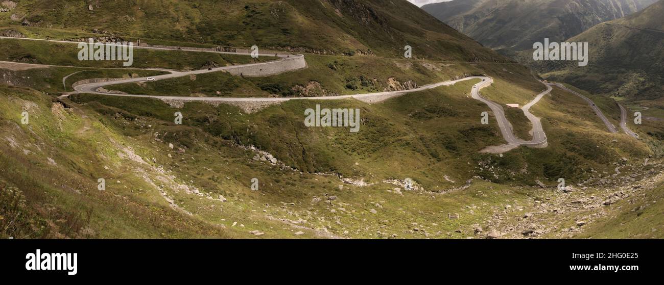 Serpentine road leading up to the Furka Pass in Grisons, Switzerland Stock Photo