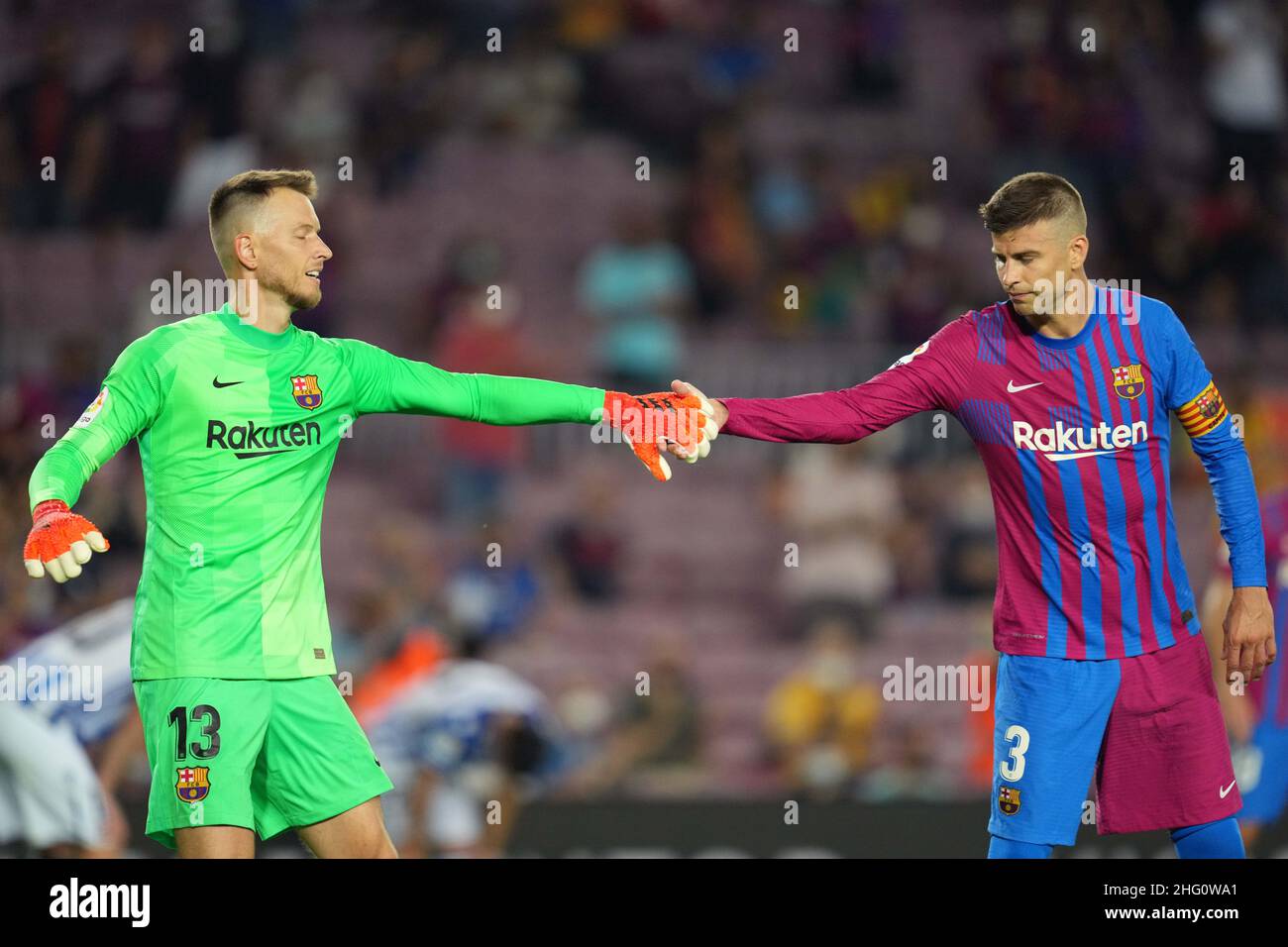 Norberto Murara Neto and Gerard Pique of FC Barcelona during the La Liga match between FC Barcelona and Real Sociedad played at Camp Nou Stadium on August 15, 2021 in Barcelona, Spain. (Photo by PRESSINPHOTO) Stock Photo