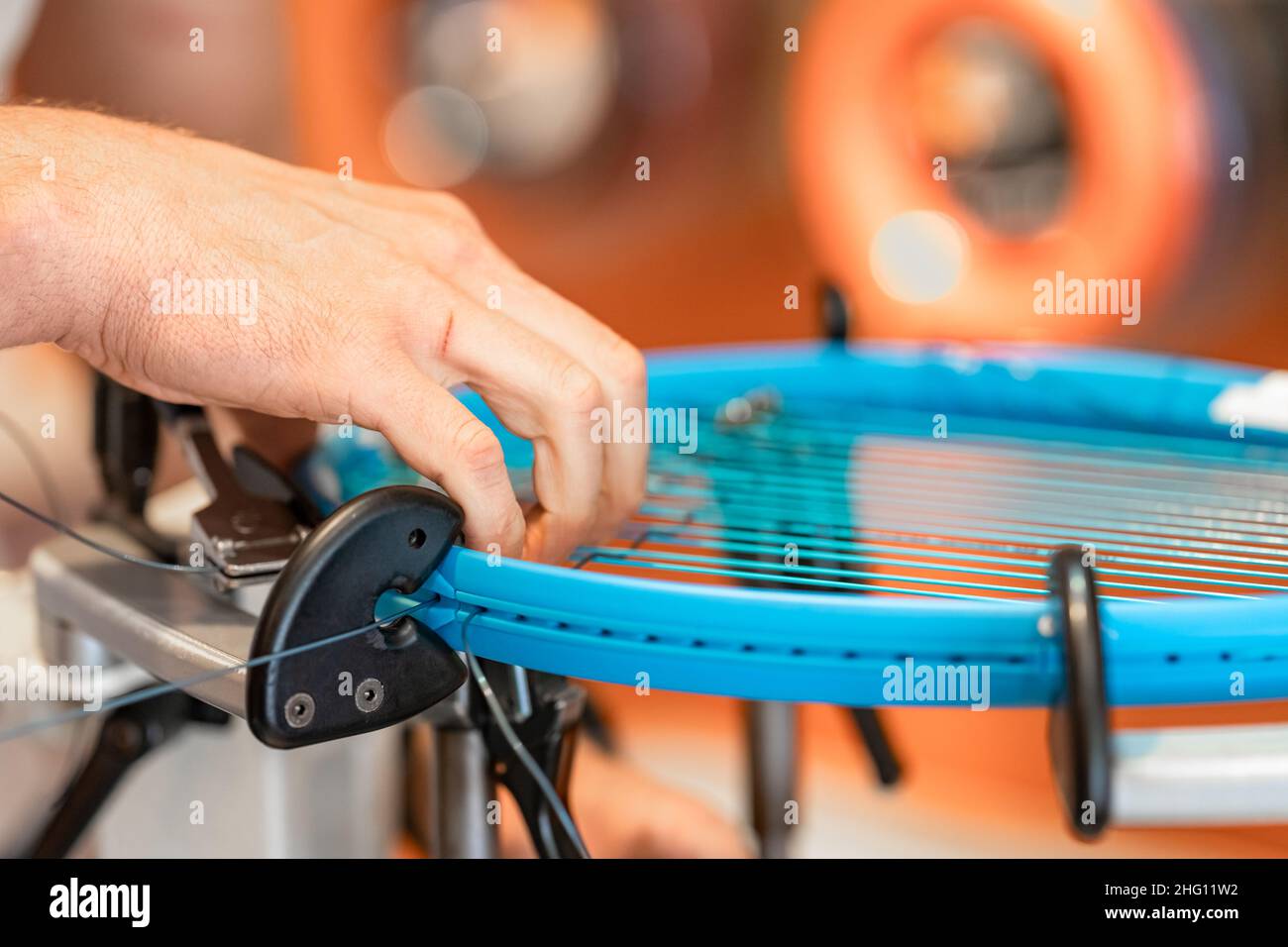 manual stringing of a tennis racket in service Stock Photo Alamy