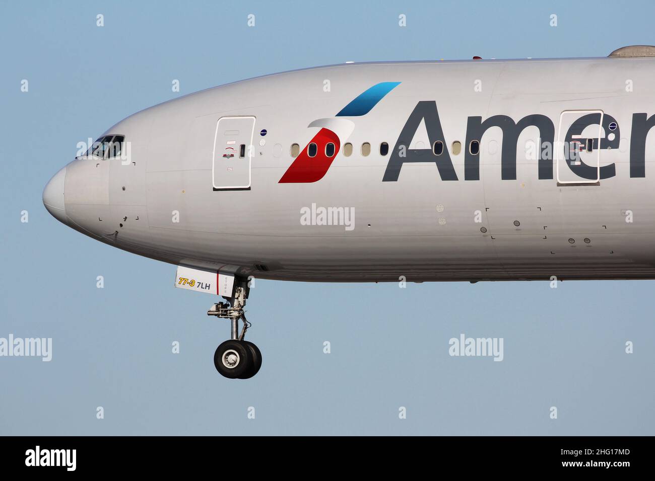 American Airlines Boeing 777-300ER arriving at London Heathrow airport after a flight from the USA Stock Photo