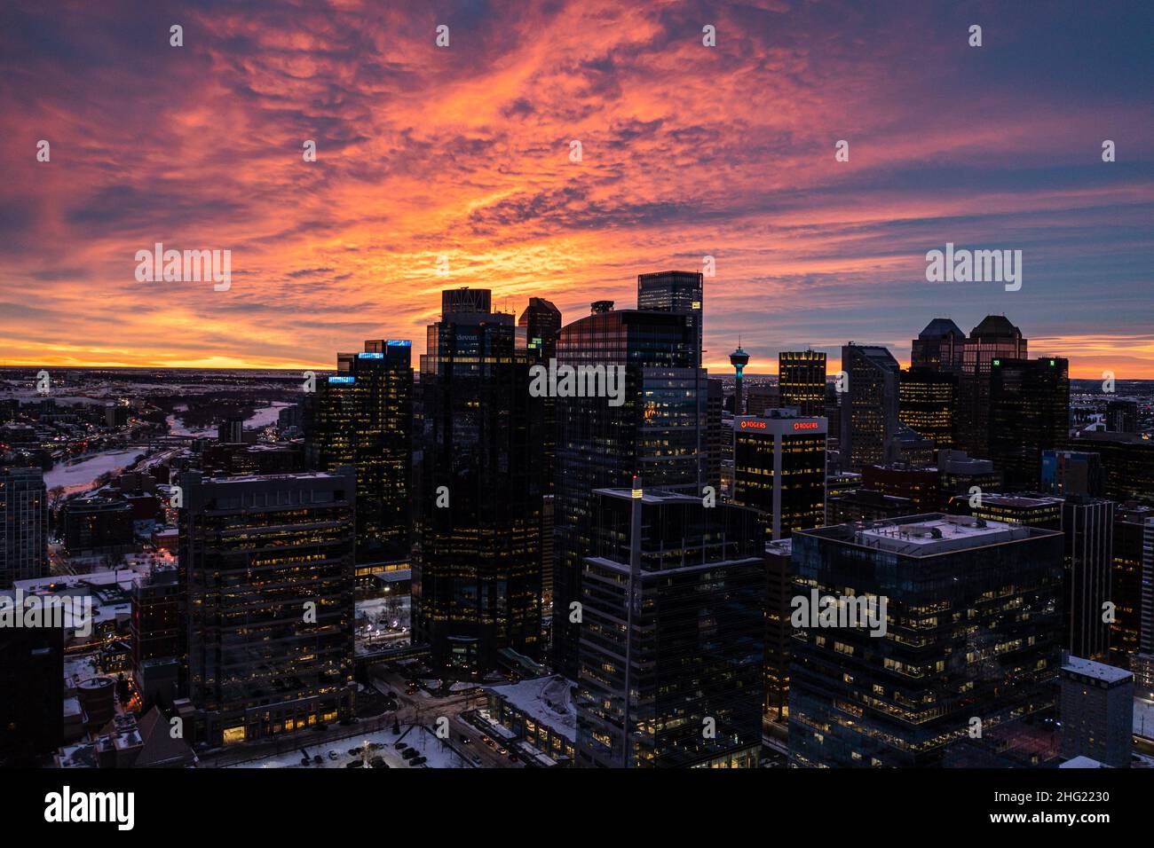 Fiery Sunrise Over Downtown Calgary During Winter Stock Photo
