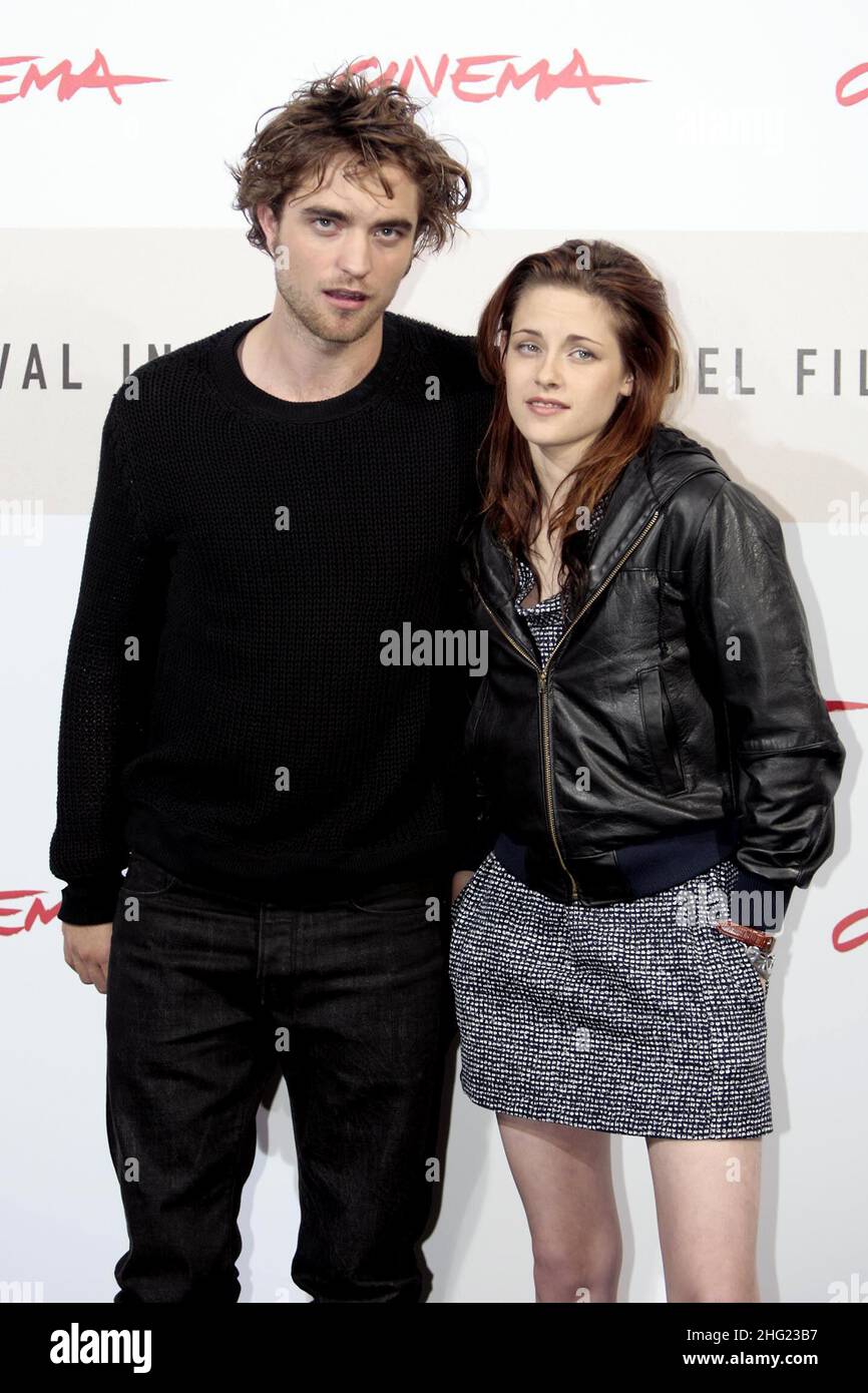 Robert Pattinson and Kristen Stewart attend the 'Twilight' photocall during the 3rd Rome International Film Festival held at the Auditorium Parco della Musica in Rome, Italy. Stock Photo