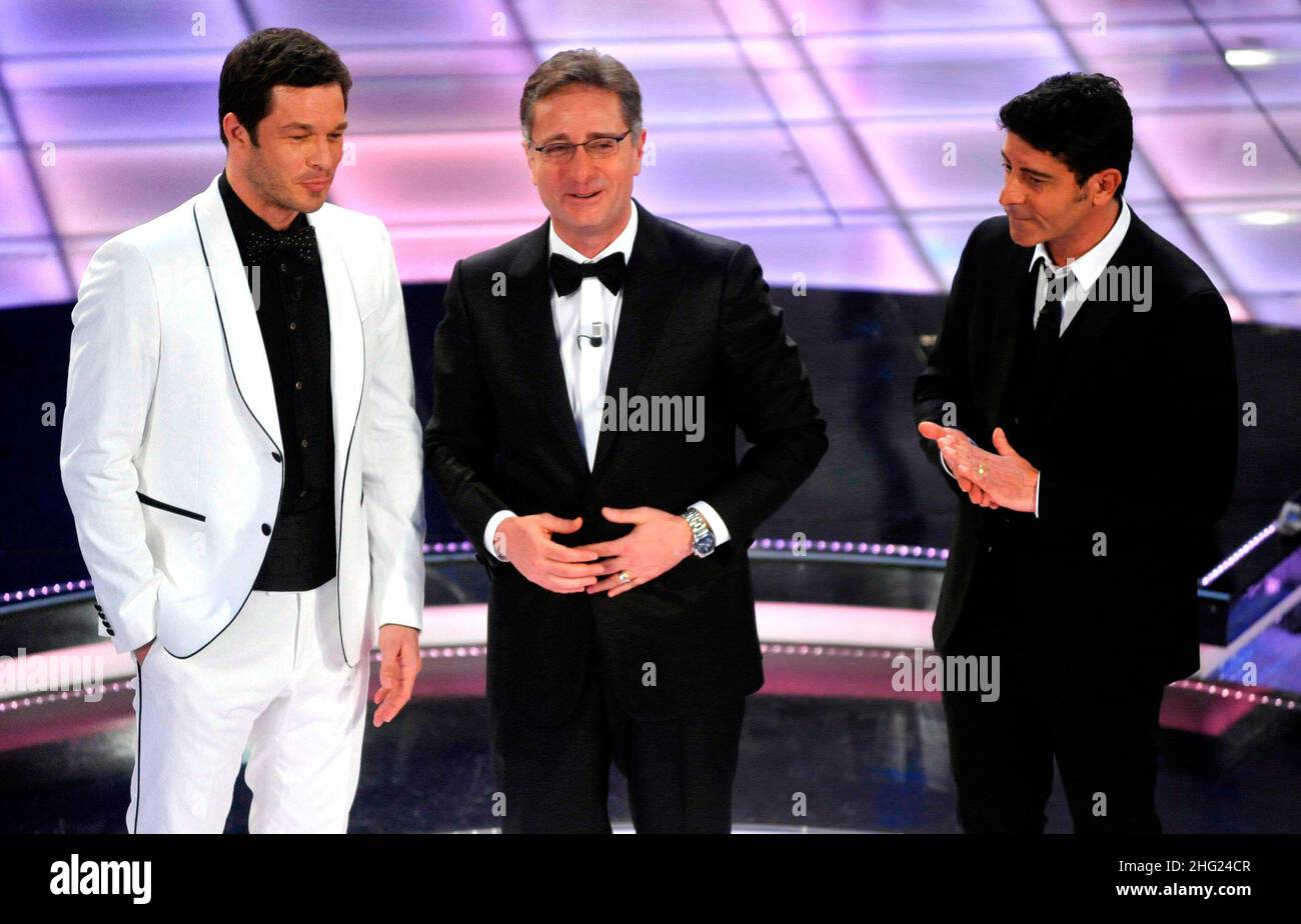 Bonolis, Laurenti and Paul Sculfor during the 59th Italian Music Festival in Sanremo, Italy. Stock Photo
