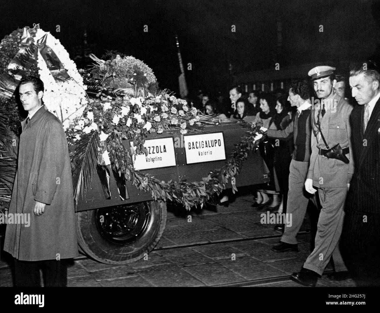 The funeral procession of victims from the Superga Air Disaster which included the Torino A.C. football squad, popularly known as Il Grande Torino.  The coffins of Mazzola and Bacigalupo are pictured. Stock Photo