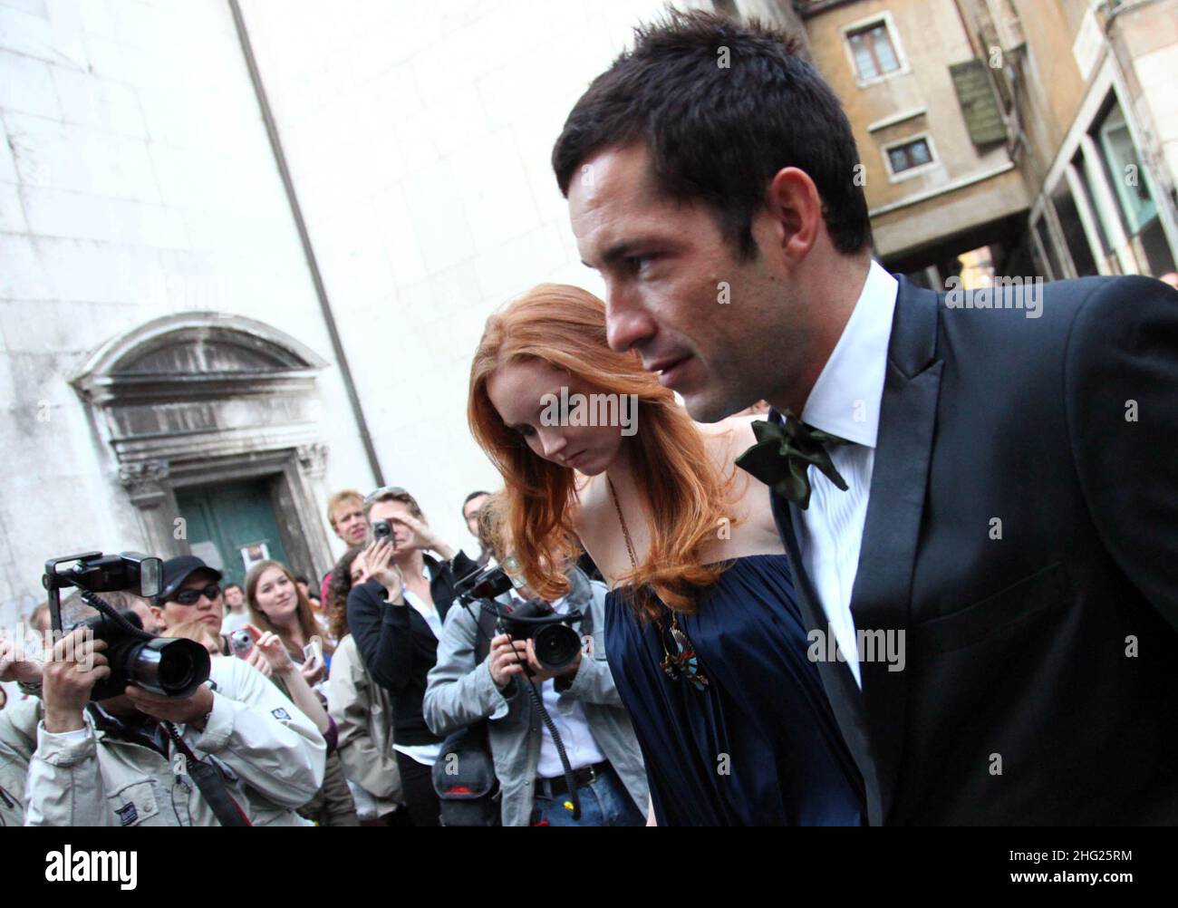 English model Lily Cole and actor Enrique Murciano arrive for the wedding ceremony of actress Salma Hayek and businessman Francois-Henri Pinault at the 'La Fenice' Theatre, in Venice, Italy on Saturday, April 25, 2009. Stock Photo