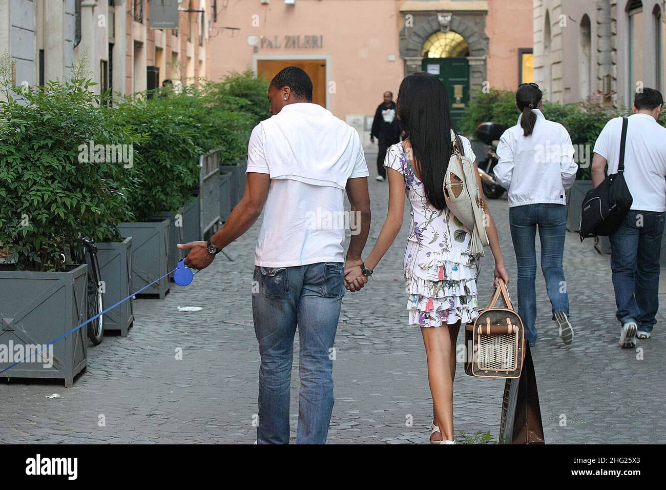 Brazilian football player Julio Baptista walking in Rome with girlfriend, the spanish model Silvia Nistal.  Stock Photo