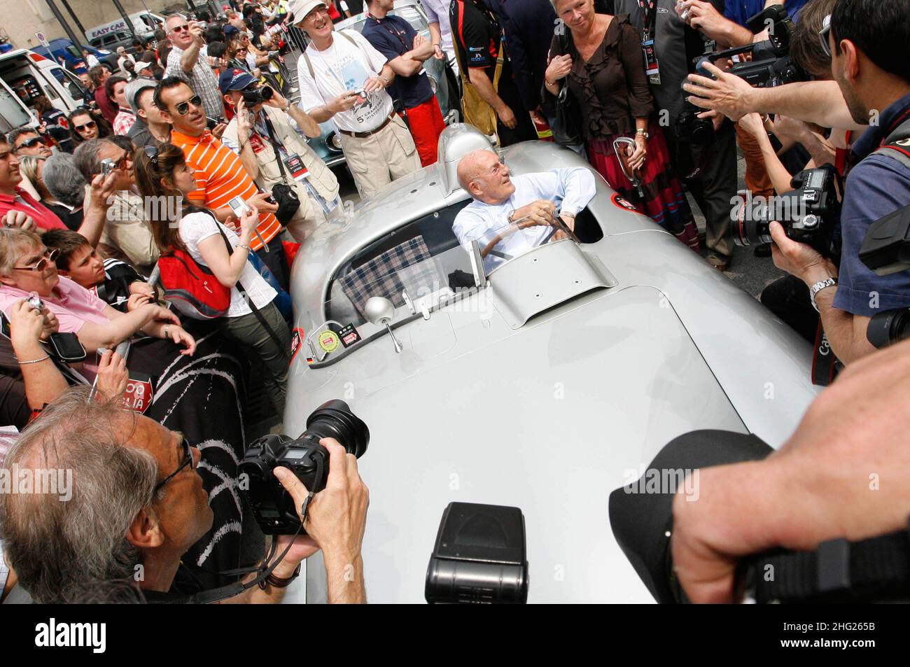 Stirling Moss at the Mille Miglia Vintage Car Race in Brescia, Italy. Stock Photo