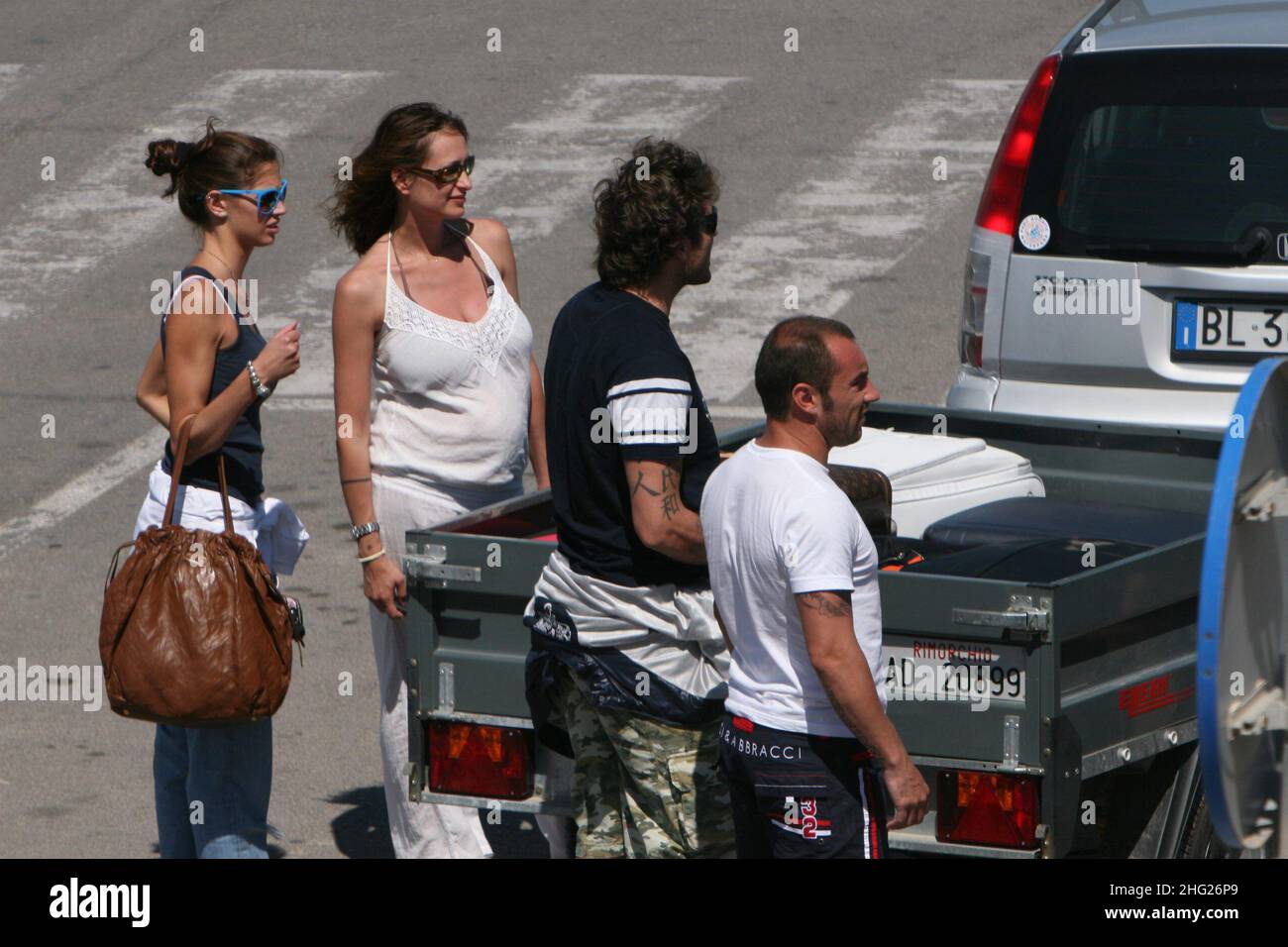 Soccer player Christian Vieri arriving in Formentera with girlfriend Melissa Satta and friend Bombardini with wife Giorgia Palmas, Baleari Islands, Spain.  Stock Photo