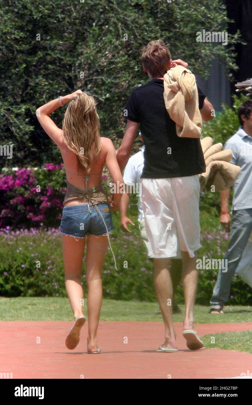 Portsmouth footballer Peter Crouch with his girlfriend Abbey Clancy on holiday in Porto Cervo, Sardinia. Stock Photo