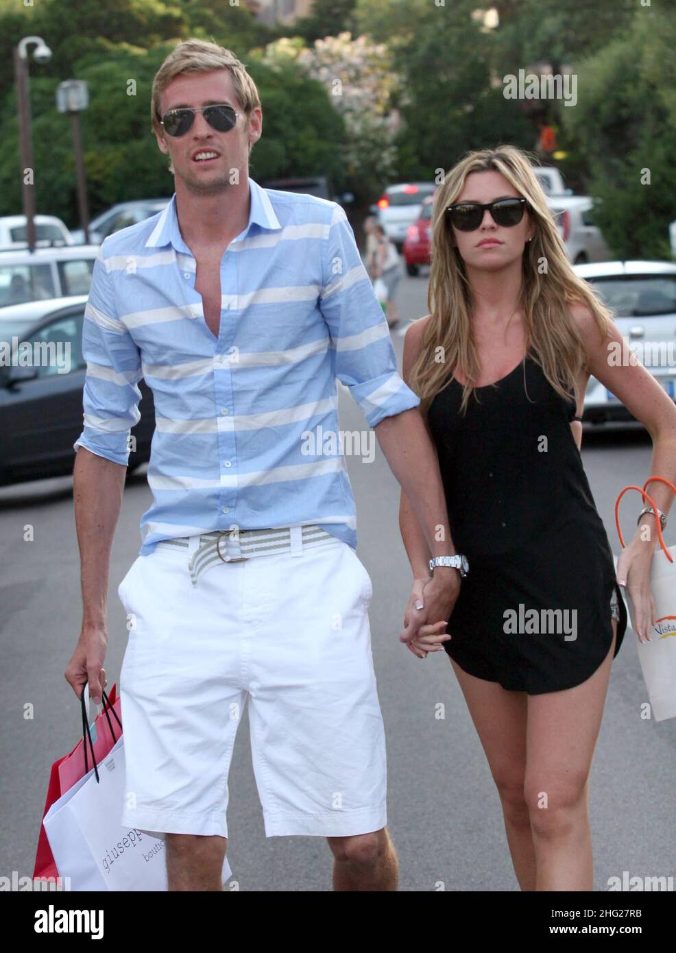 Peter Crouch and girlfriend Abigail Clancy out shopping whilst on holiday in PortoCervo, Sardinia. Stock Photo