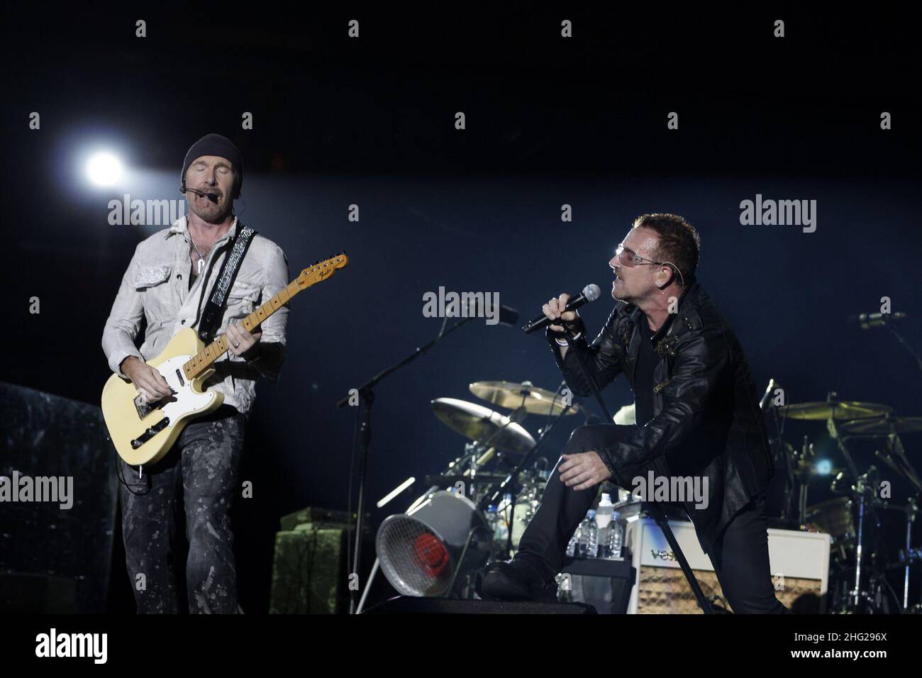 The Edge (l) and Bono (r) from the band U2 perform in concert at the ' Charles Ehrmann' stadium as part of their 360 degree Tour in Nice, France Stock Photo