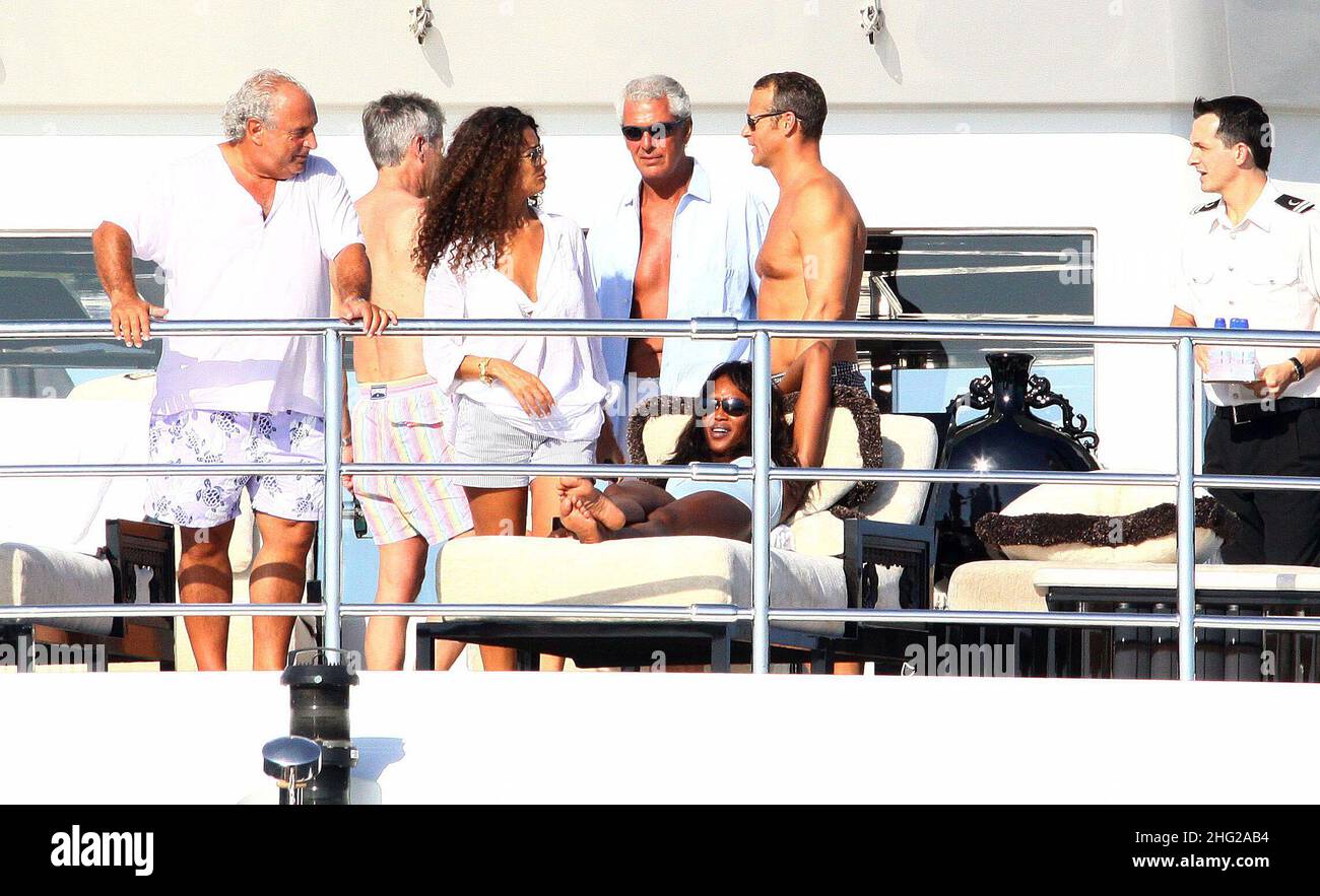 Naomi Campbell and boyfriend Vladimir Doronin and friends Marco Tronchetti Provera and Afef Jnifen on a yacht in Formentera, Spain  Stock Photo