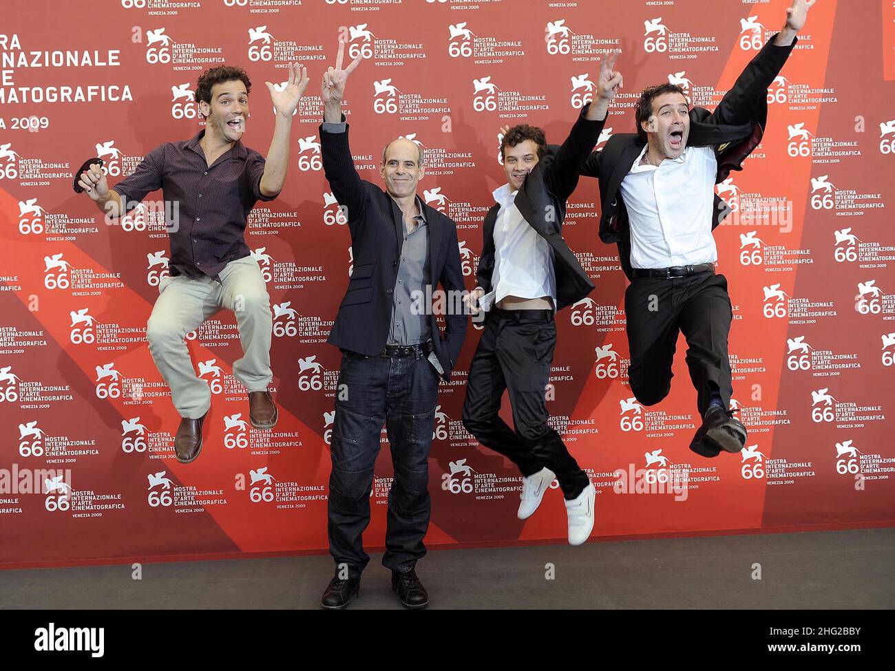 The cast (Actor Yoav Donat, director Samuel Maoz, actor Michael Moshonov and actor Zohar Strauss) pose during the 'Lebanon' photocall during the 66th Venice Film Festival.  Stock Photo