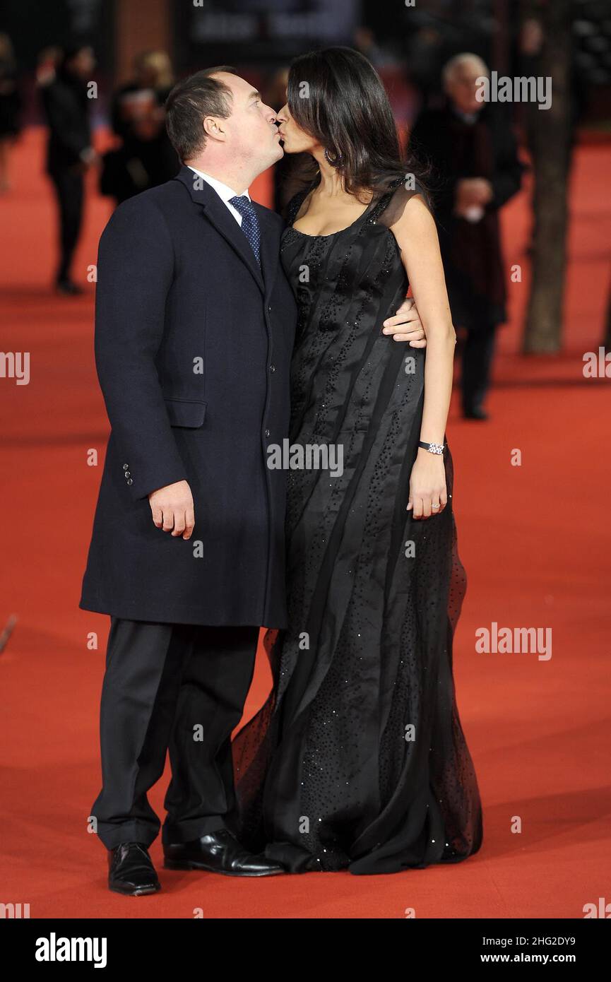 Maria Grazia Cucinotta with her husband Giulio Violati arriving for