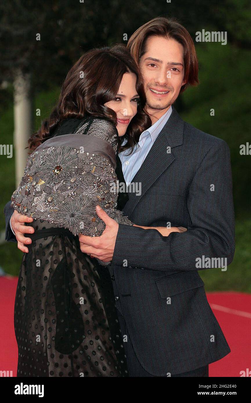 Asia Argento and husband Michele Civetta attend the screening of 'Dream rush'  during the 4th Rome Film Festival in Rome, Italy.    Stock Photo