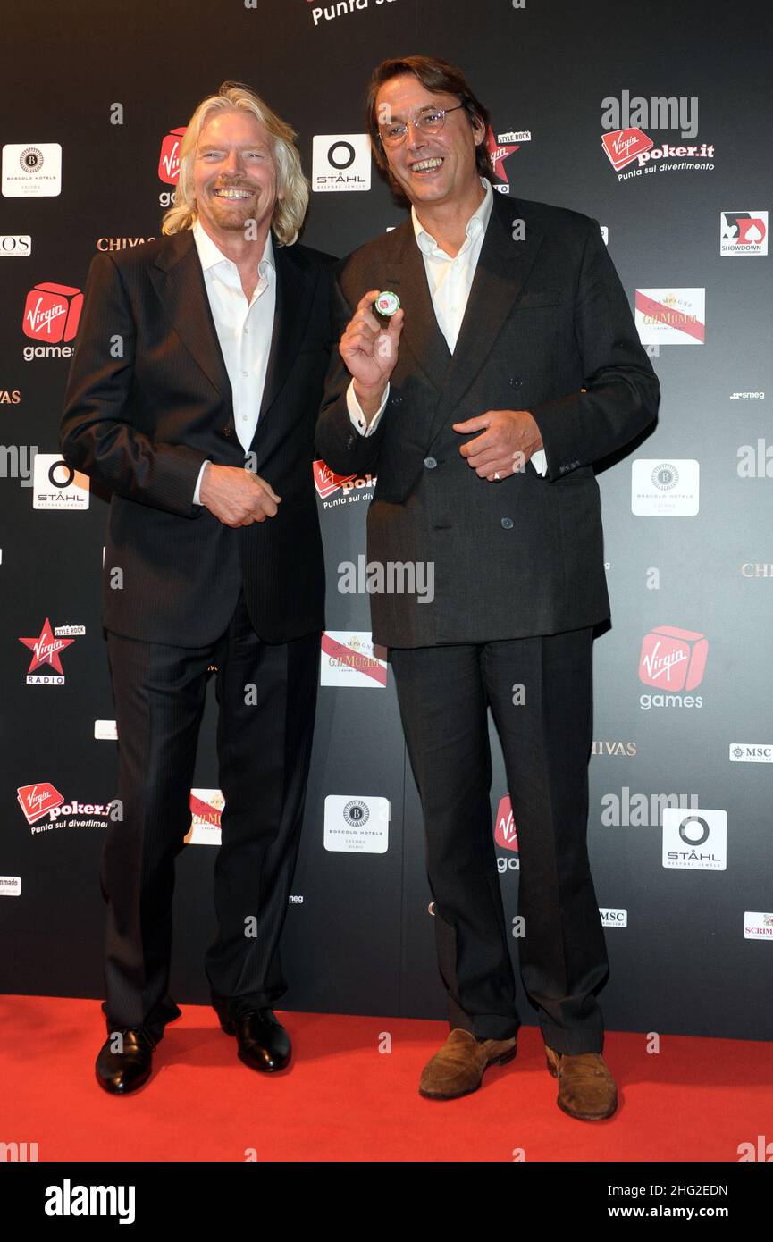 Richard Branson with Simon Burridge, CEO Virgin Games arriving for Virgin Games Charity Gala in Milan, Italy Stock Photo