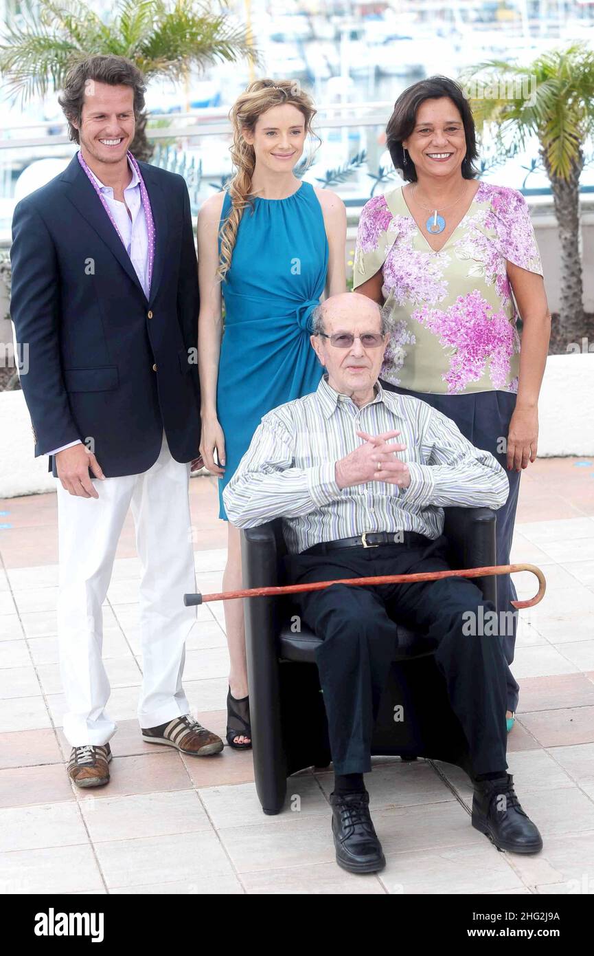in the photo: (Left to Right) Actor Ricardo Trepa, actresses Ana Maria Magalhaes and Pilar Lopez with director Manoel De Oliveira during  'The Strange Case Of Angelica' Photocall, France Stock Photo