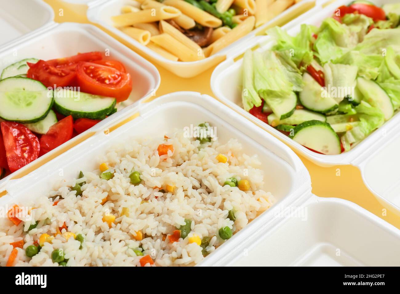 Containers with different tasty food, closeup Stock Photo