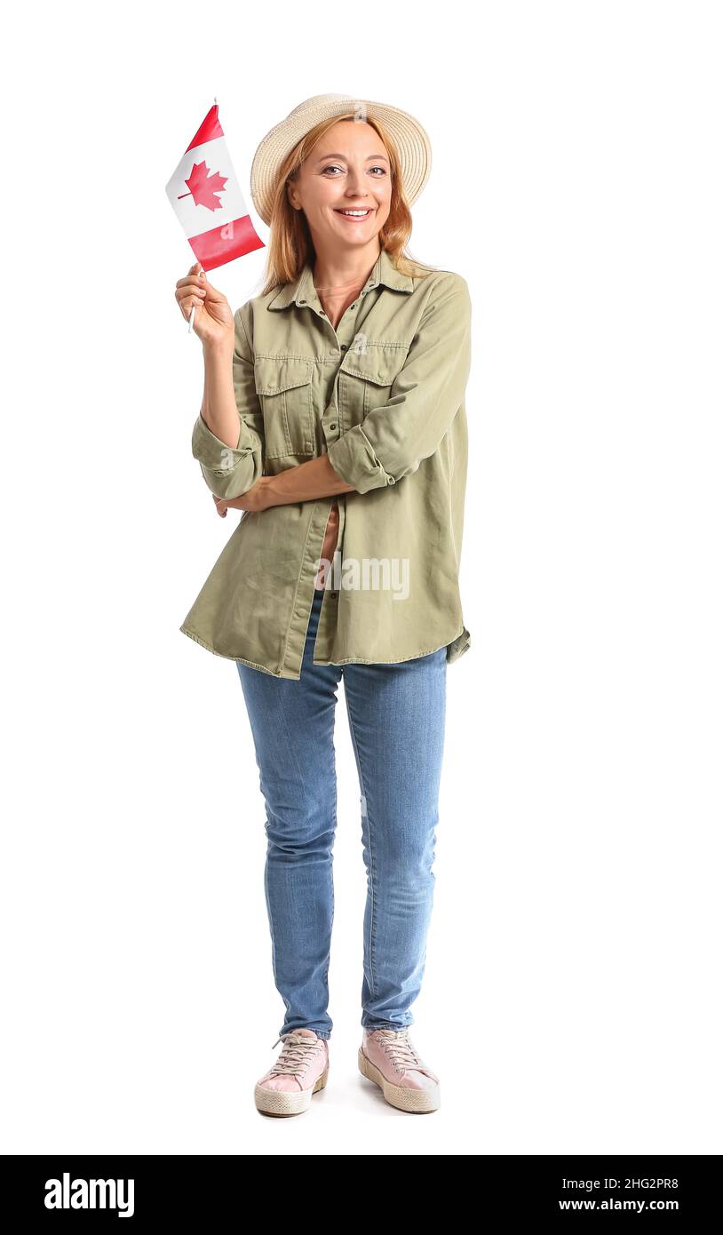 Mature woman with Canadian flag on white background Stock Photo - Alamy