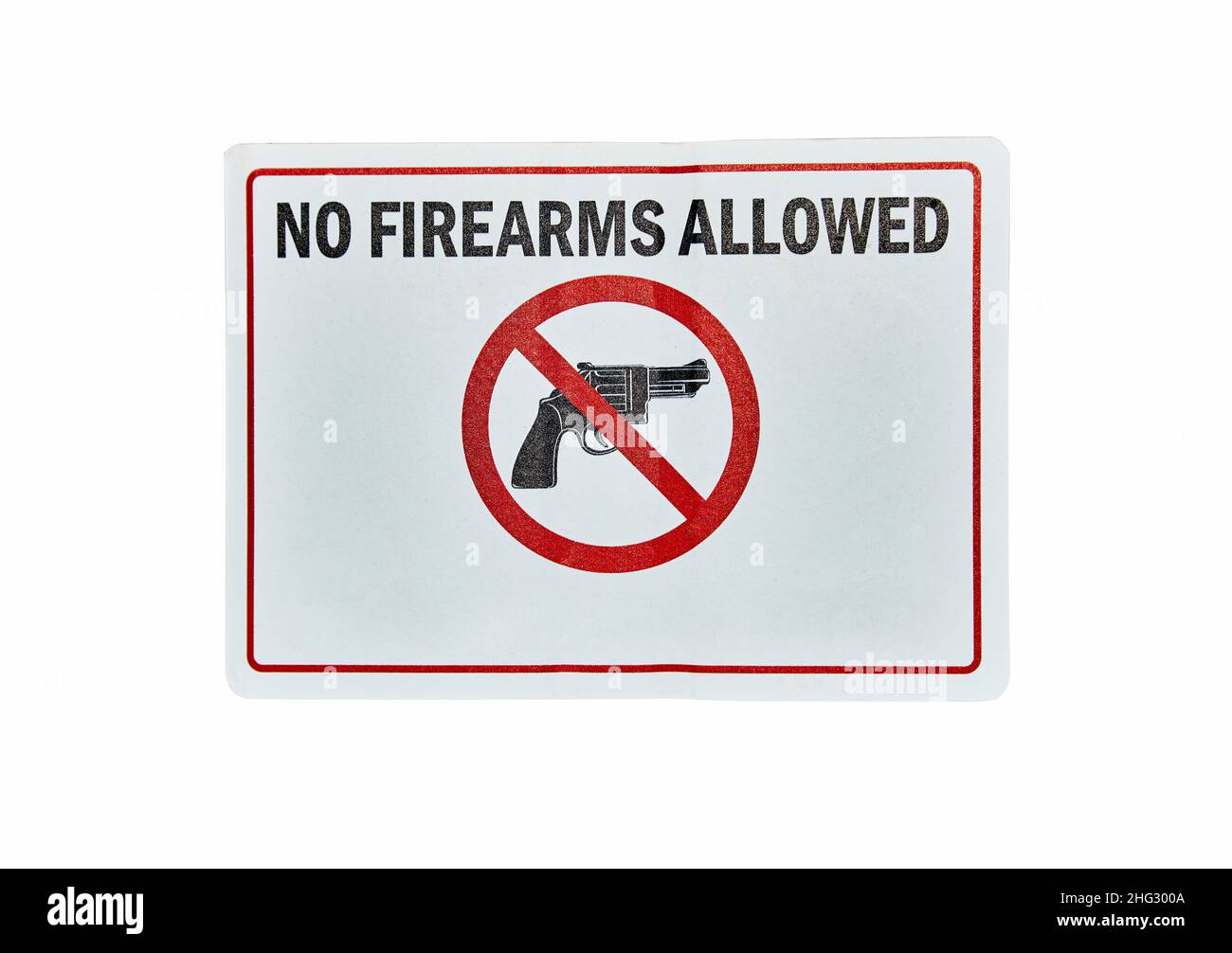 No firearms allowed sign hanging on wall Stock Photo