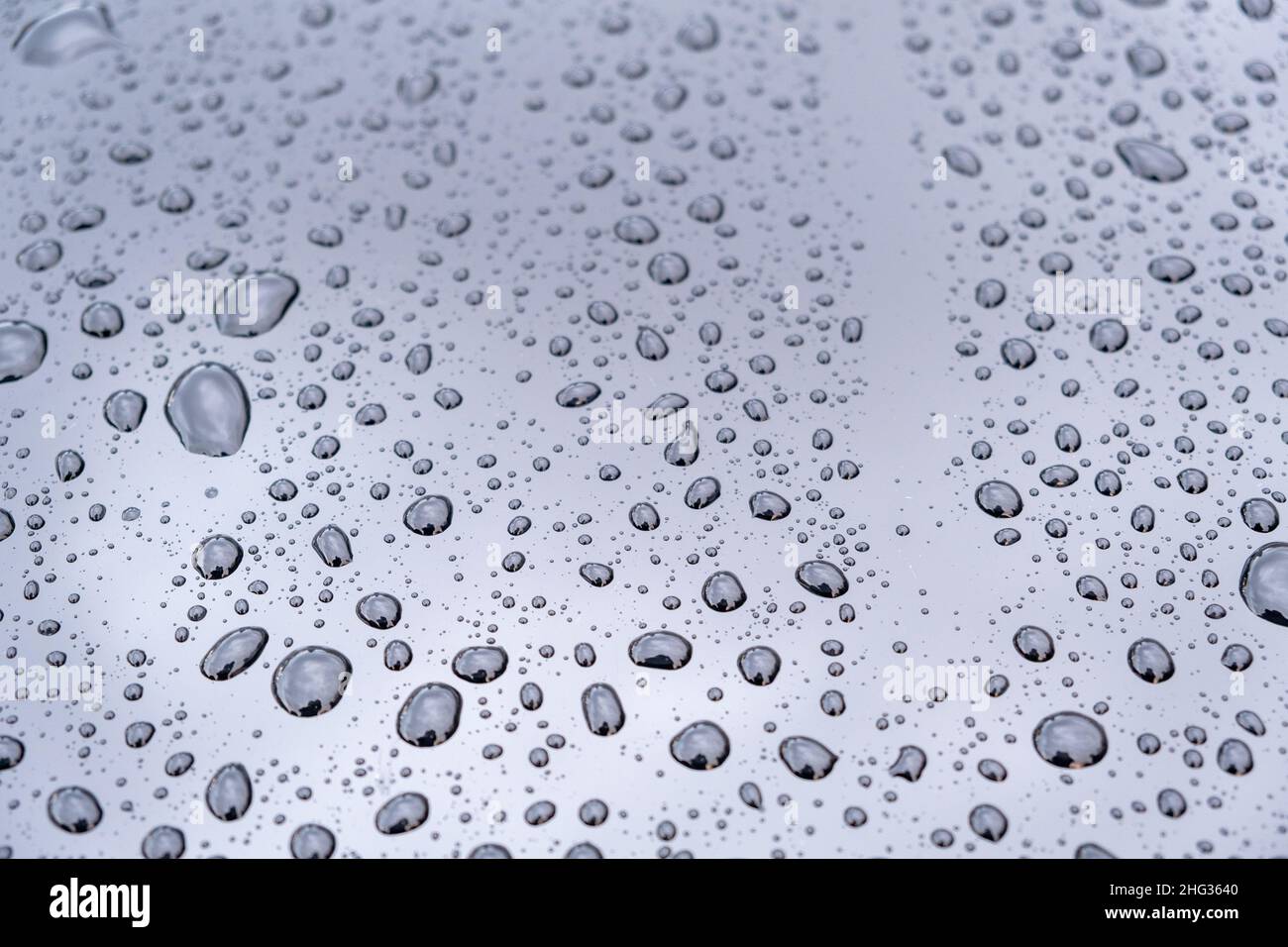 Rain drops on the mirror with text space Stock Photo