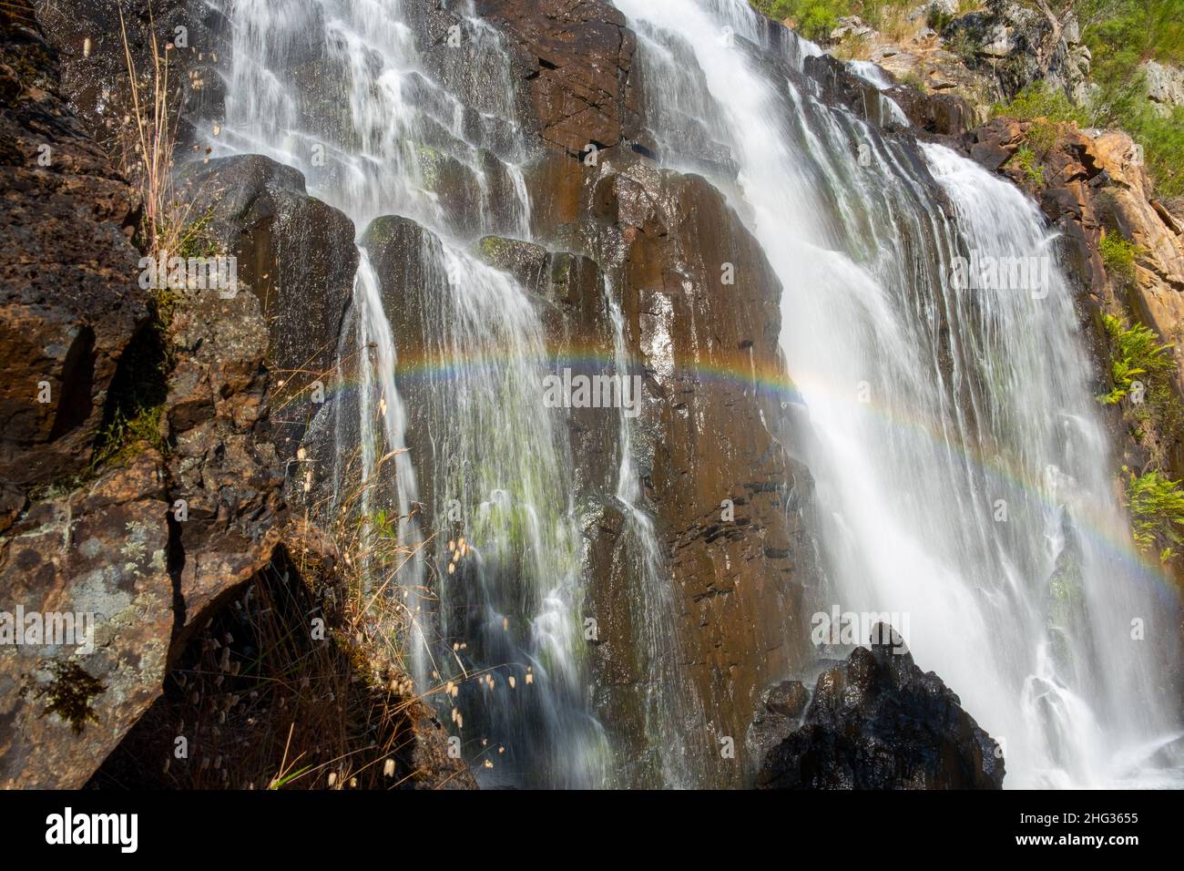 Scenic waterfall with rainbow - closeup Stock Photo