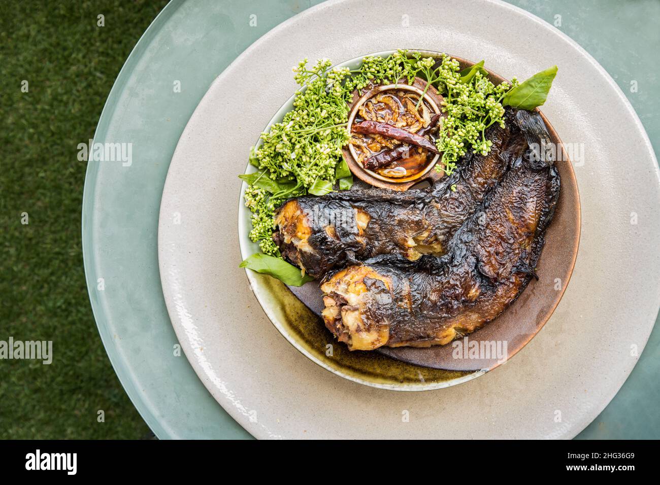 Grilled catfish (Roasted Catfish) and neem leaf served with sweet