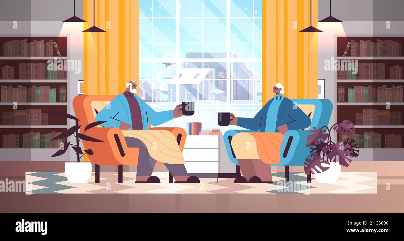 senior african american couple drinking coffee and talking together at ...