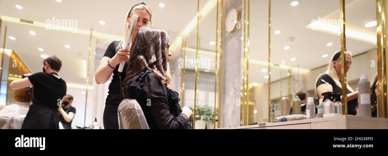 Pretty client with long hair Stock Photo