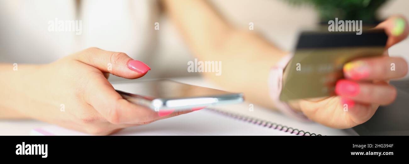 Lady doing outpayment Stock Photo