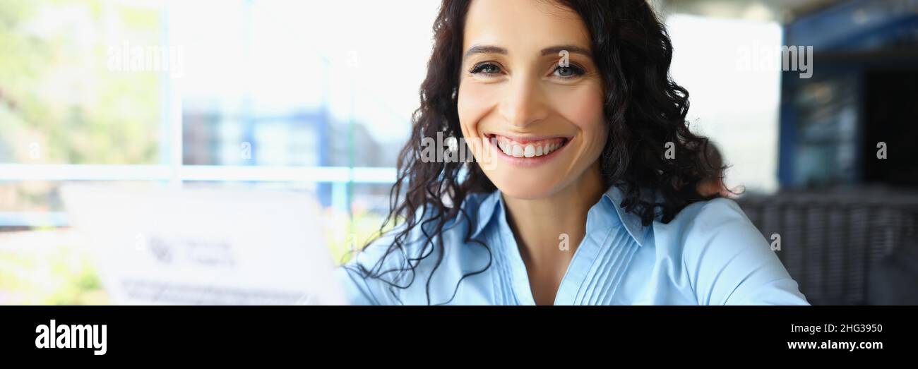 Woman holding menu of caffe Stock Photo