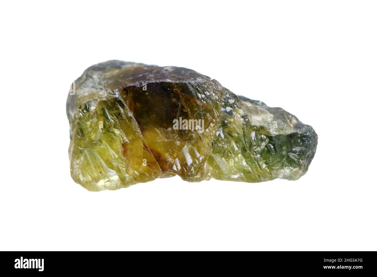 Natural rough sphene (titanite) gemstone on white background , a titanium-rich mineral group. The member of highest dispersions mineral. Stock Photo