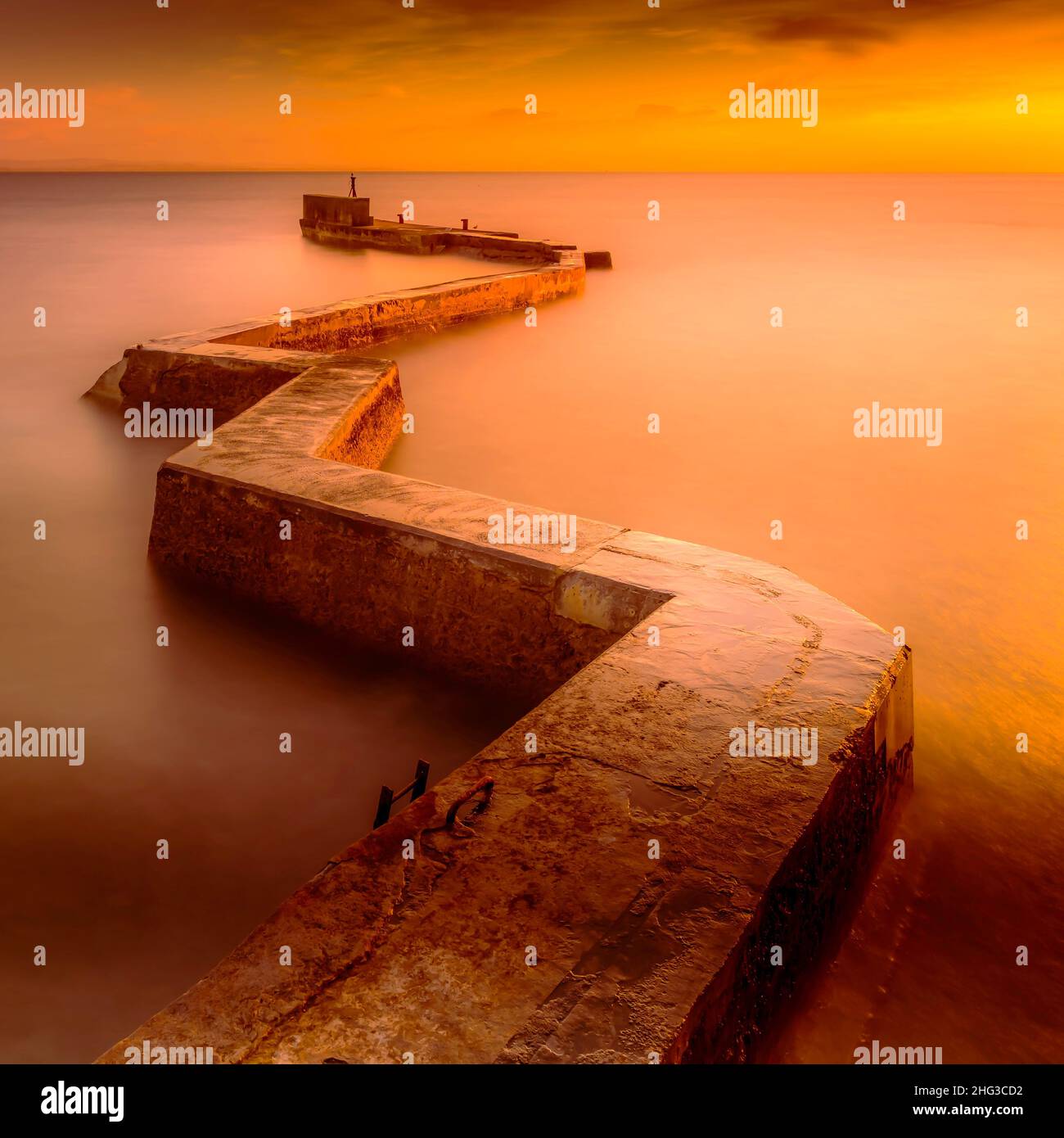 This is a view of the sea-wall at St. Monans in the East Neuk of Fife, Scotland, UK Stock Photo