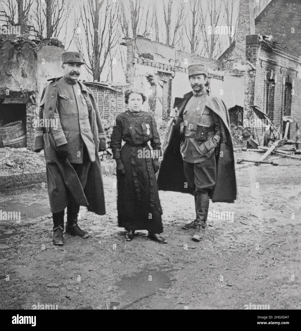 Archival photo of World War I. Ruined village of Eclusiers, France. M'lle Semmer decorated for heroic actions under fire. 1914-1918 Stock Photo