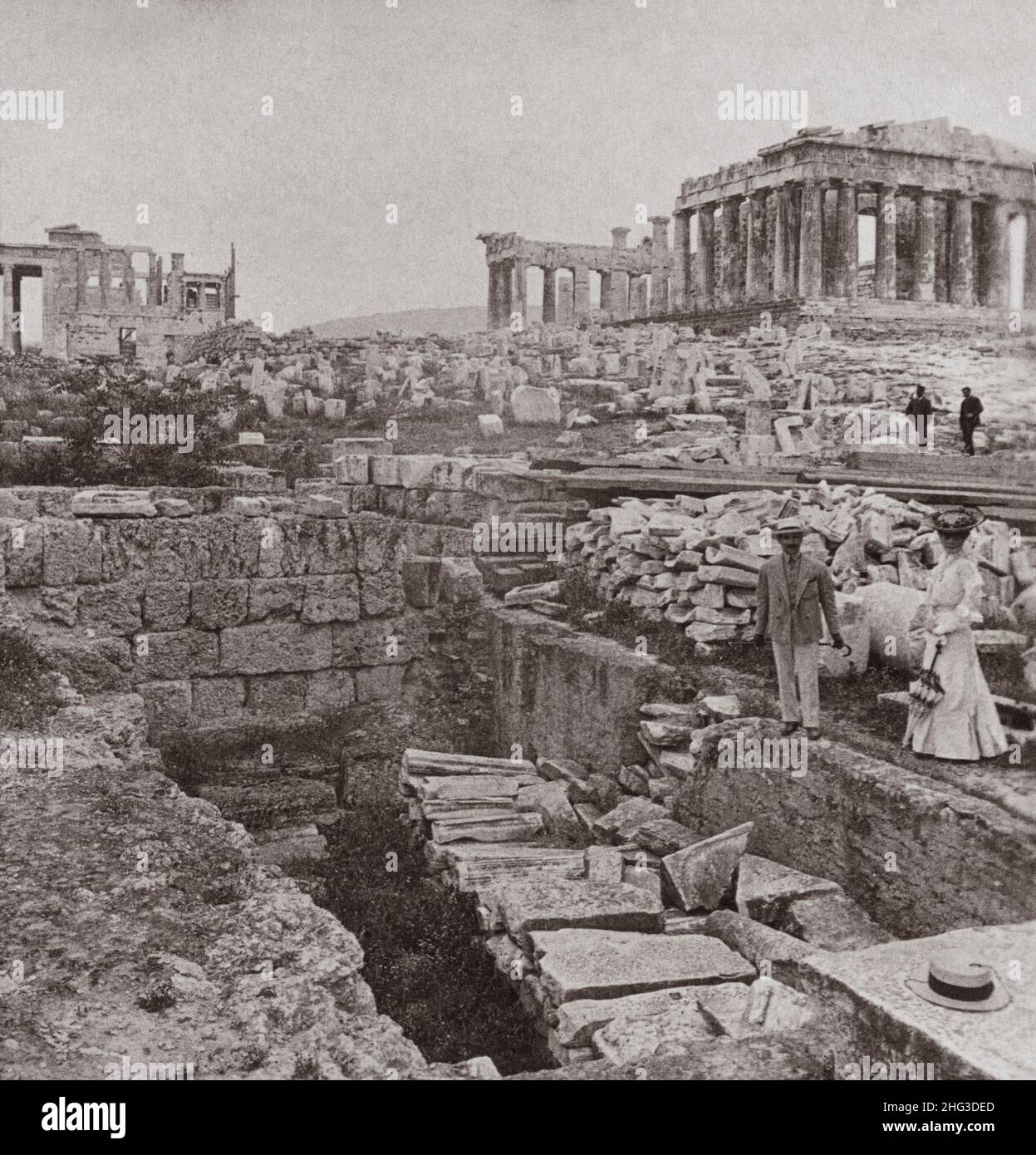 Vintage photo of Acropolis. Looking East from propylaea across ruin-strewn Acropolis to west end of Parthenon, Athens. 1906 Stock Photo