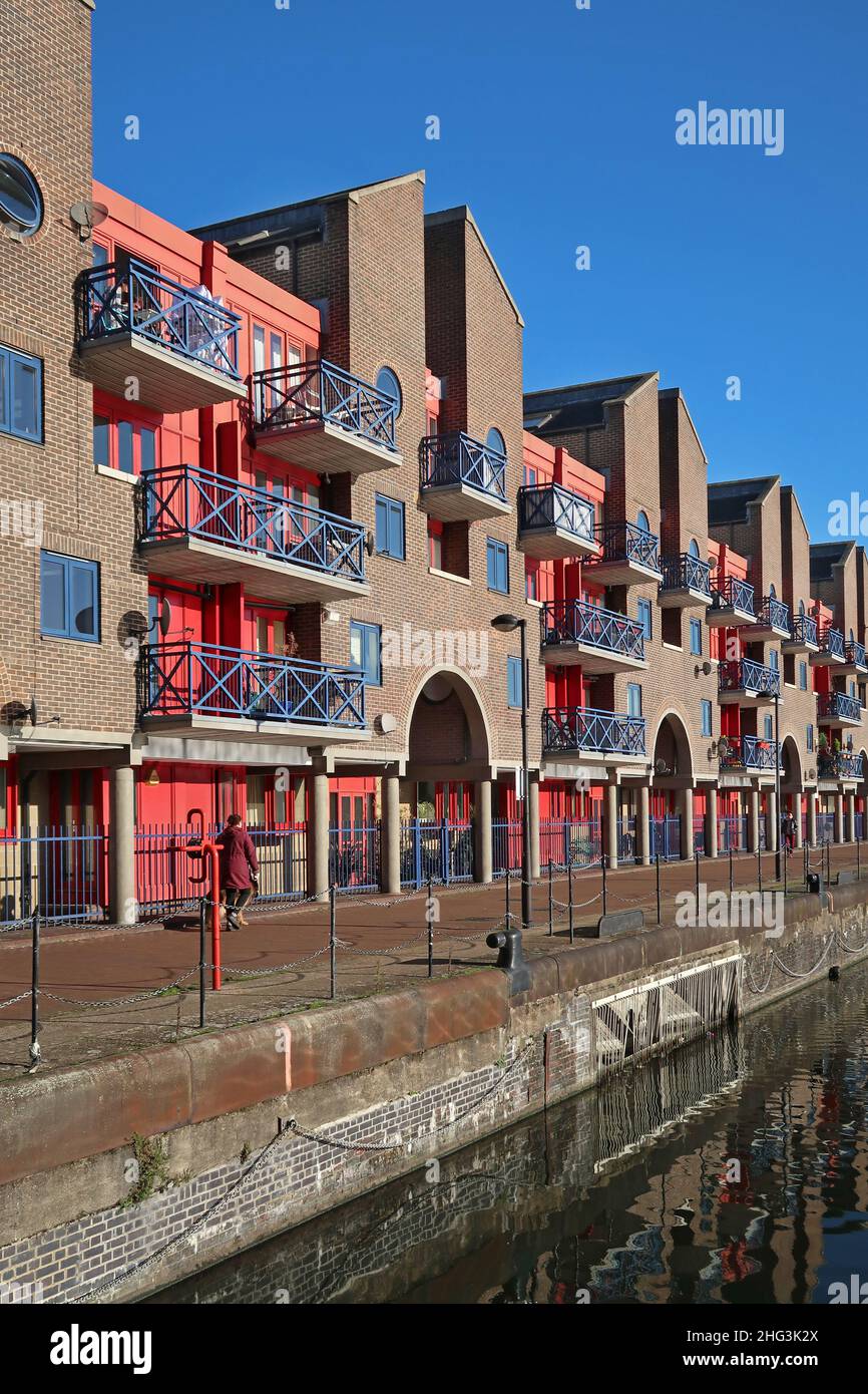 Housing on the north side of Shadwell Basin, Wapping, London. Designed in the Post Modern style by architects MJP. Stock Photo