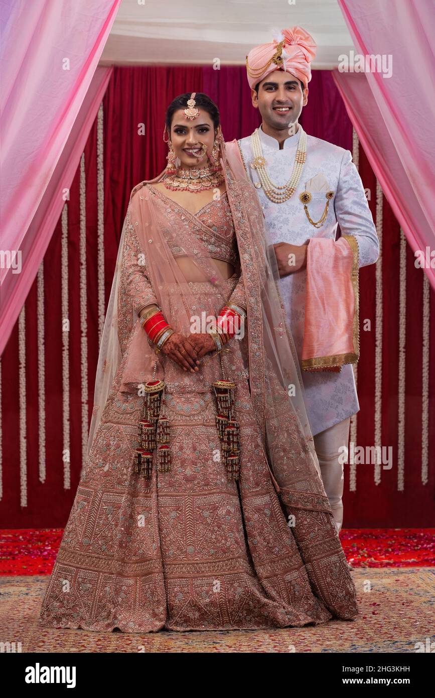 Indian couple dressed in traditional hi-res stock photography and ...