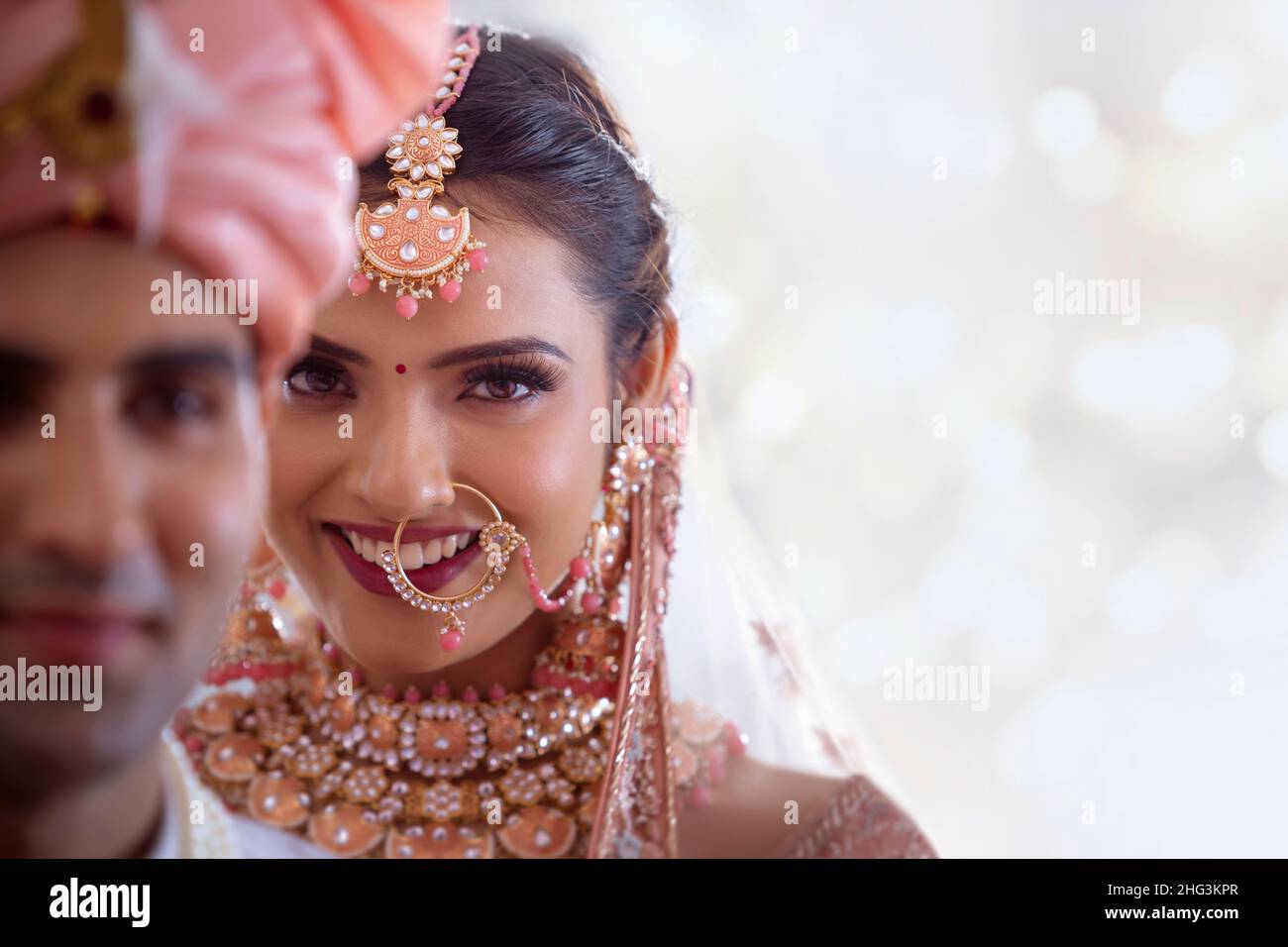 Close-up of wedding couple in a traditional wedding dress Stock Photo ...