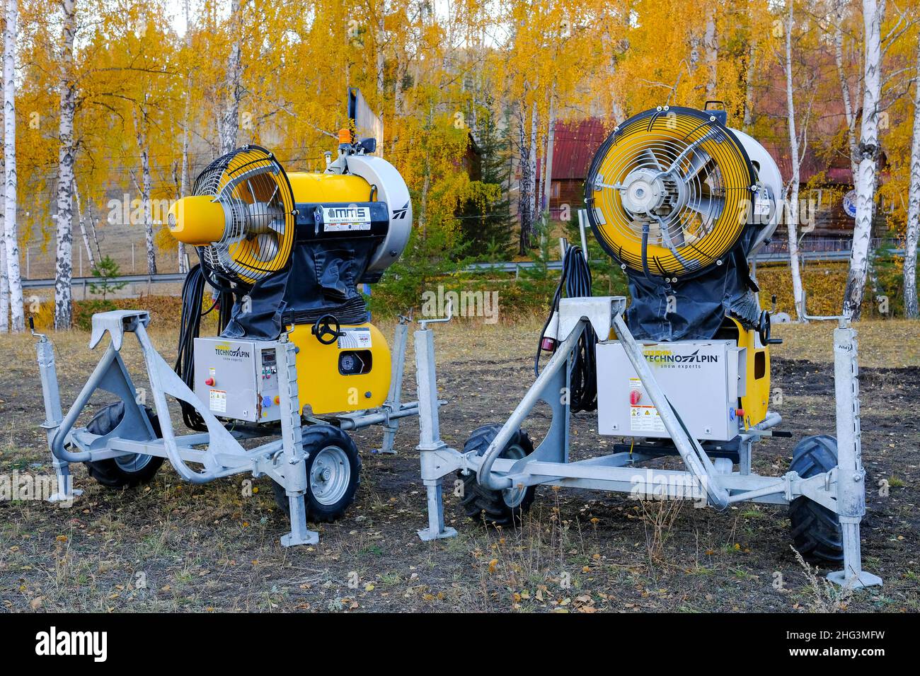 Russia, Bashkiria - 09.10.2021 - Two non-working snow cannons in autumn. Snow machine for mountain slopes. Stock Photo