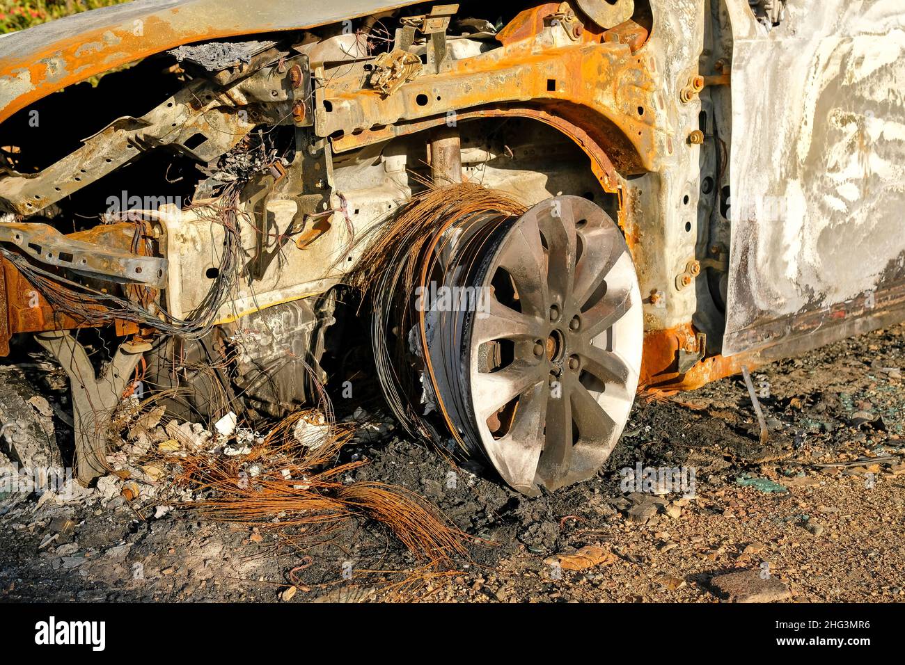 Remains of a burnt-out car. No one, outside. Stock Photo