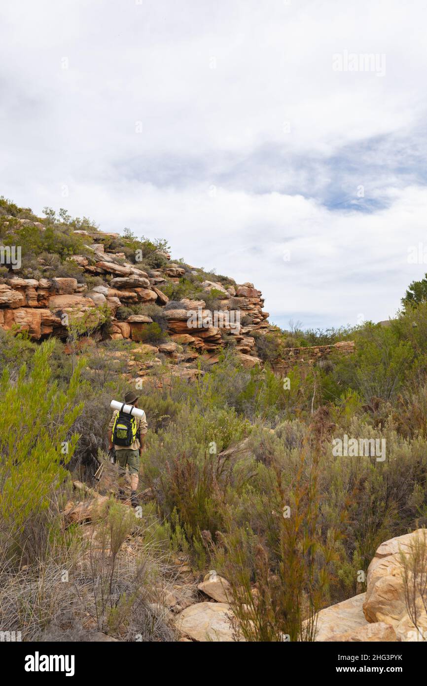 Rear view young male hiker hi-res stock photography and images - Alamy