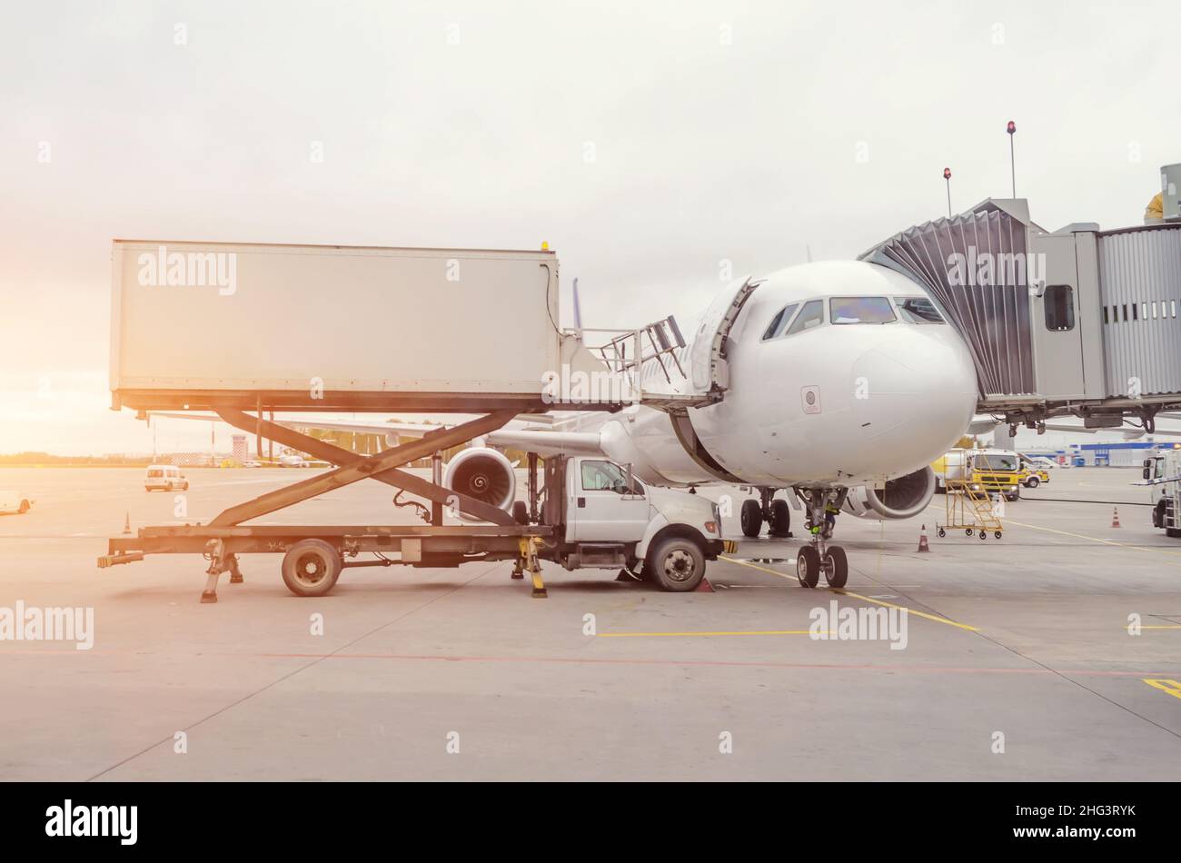 Loading food on the plane before the flight takes off Stock Photo - Alamy