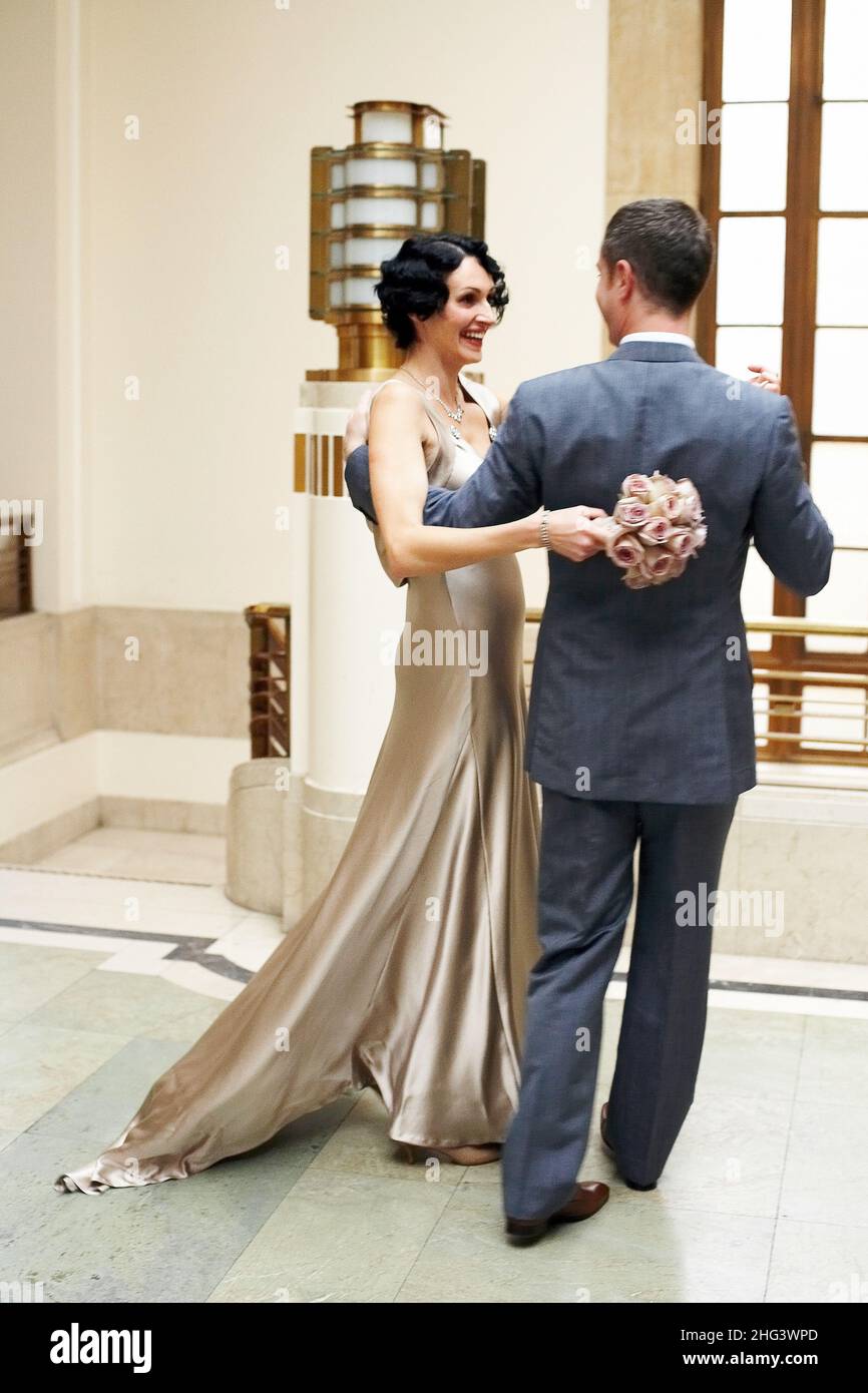 GREAT BRITAIN / London /Rare view of bride and groom living the he ceremony suite at Hackney town hall . Newlyweds registry office  . Stock Photo