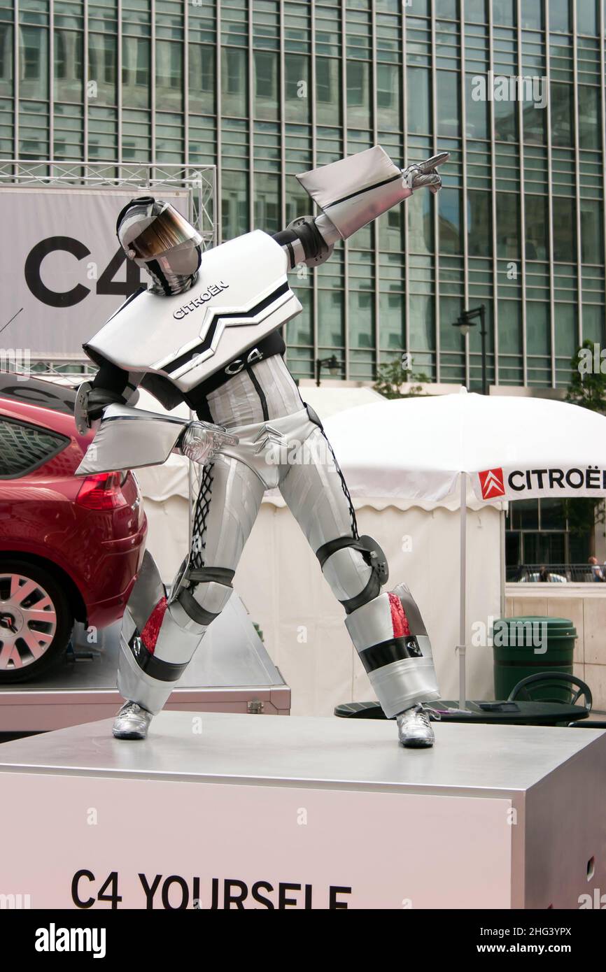 A Dancer recreating the Citroen C4 dancing robot ad, at Motorexpo 2005,  Canary Wharf, London Stock Photo - Alamy