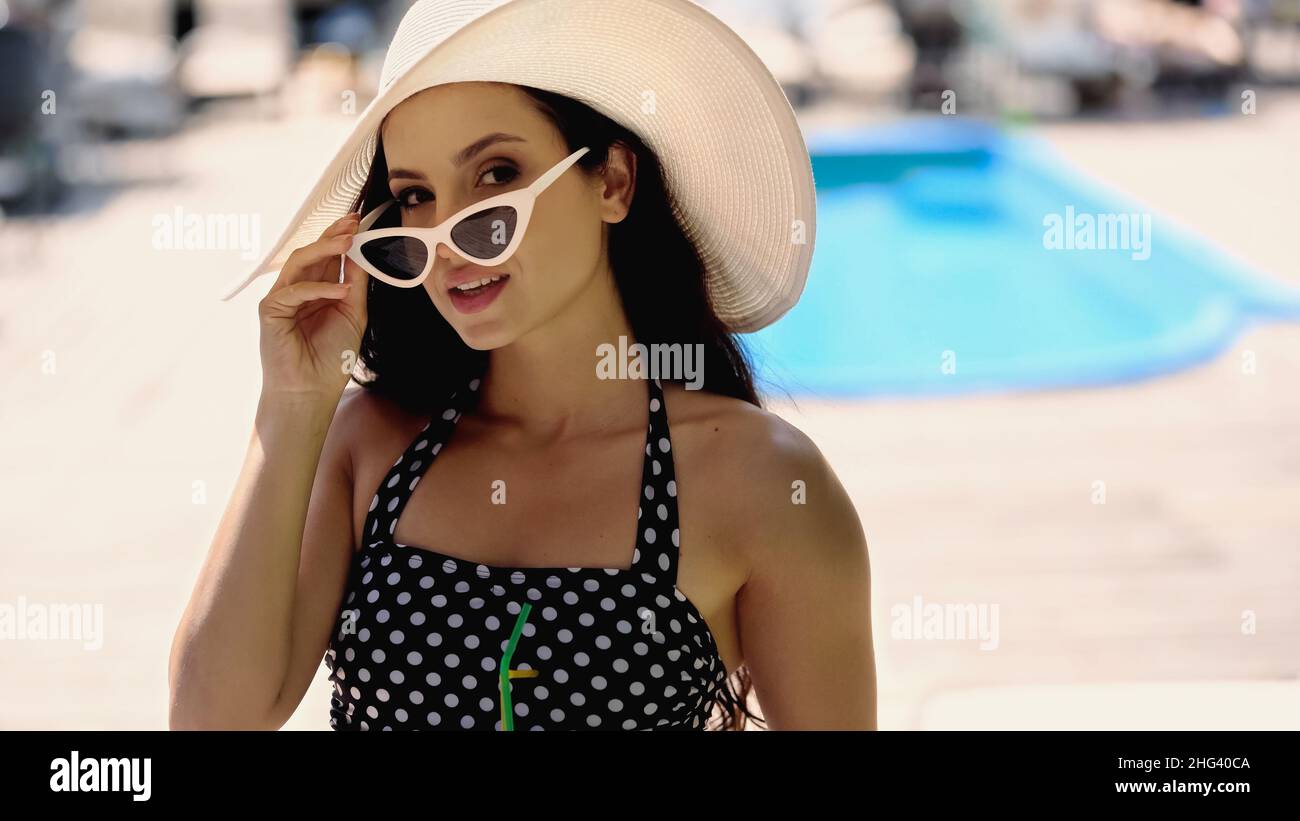 Woman wearing hat in pool hi-res stock photography and images - Alamy