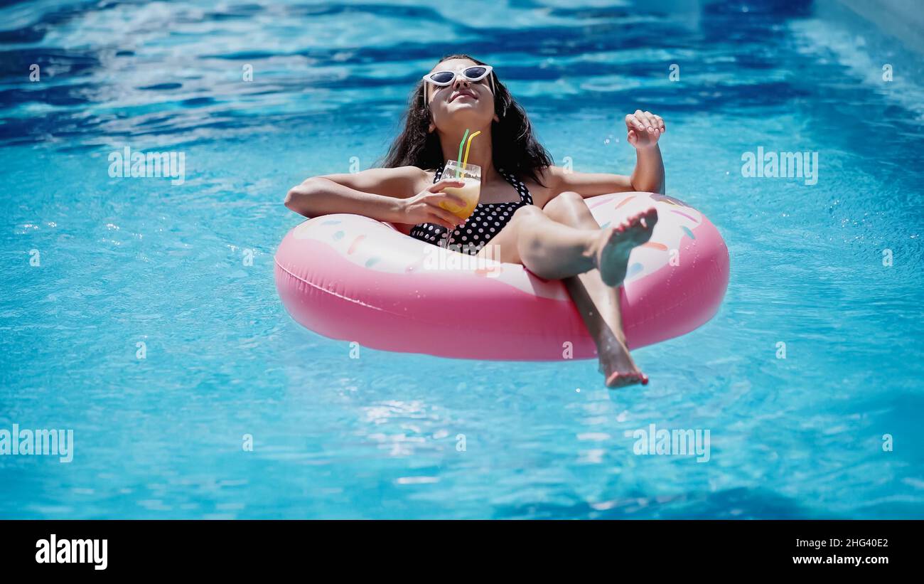 Pool Side Positive Image Positive sunbathing hi-res stock photography and images - Alamy