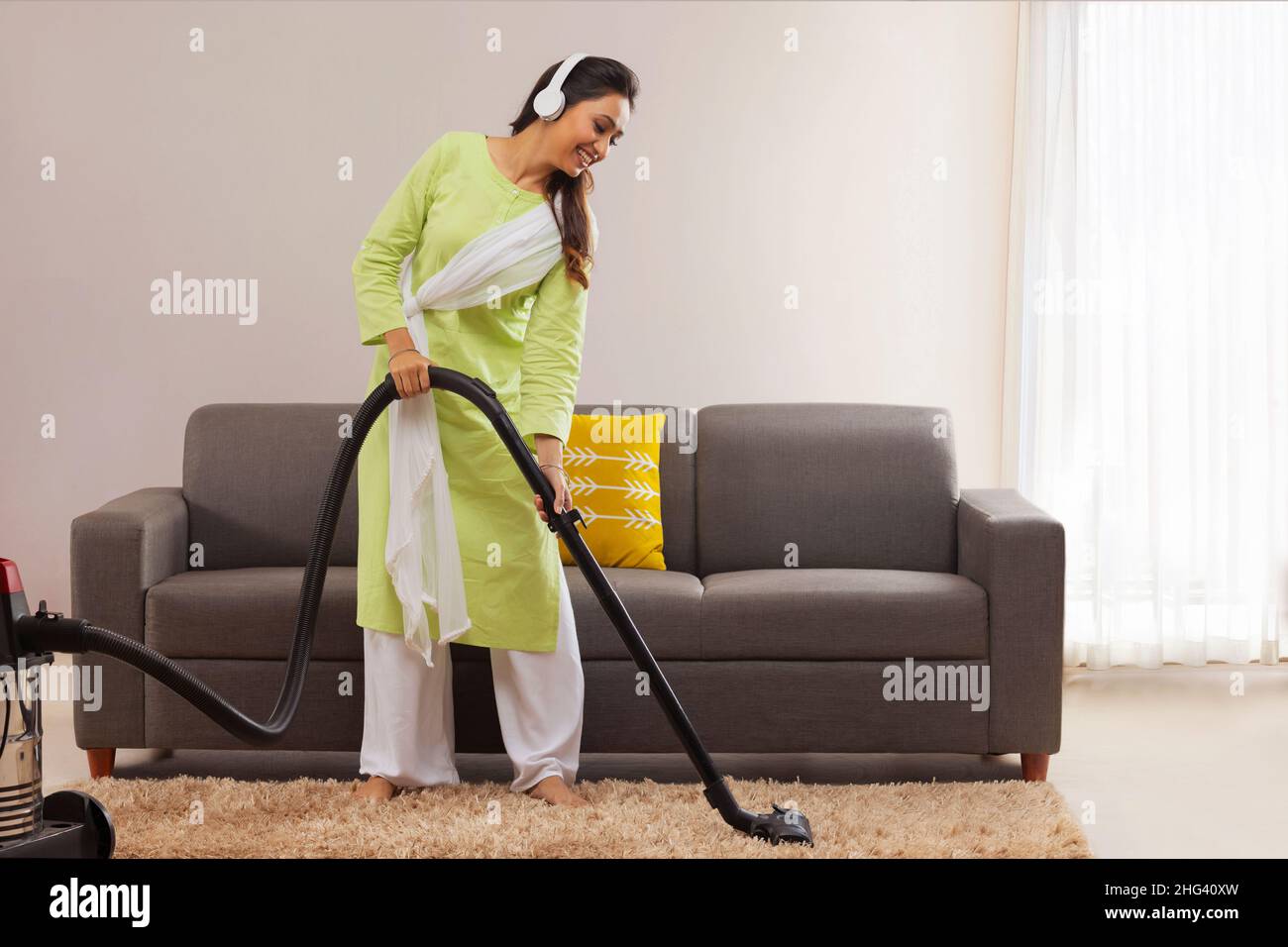 Cleaning lady sofa hi-res stock photography and images - Alamy